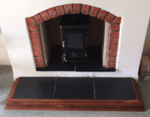 small fireplace with a stove