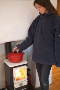 cooking on a tiny woodstove
