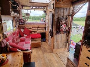 small wood burning stove in a converted removals lorry campervan