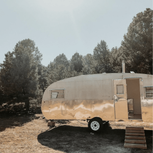 small wood burning stove installed in an airstream