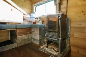 snowmads small wood burning stove installed in a mercedes truck conversion 16