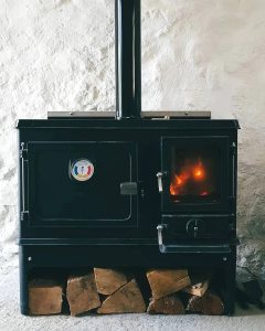 small wood burning cook stove installed in a scottish bothy 5