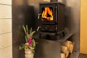 small wood burning stove installed in a shepherds hut