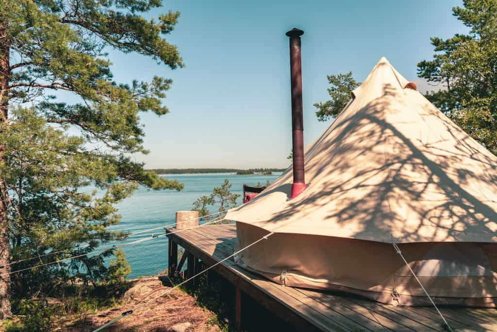 small wood stove installed in a glamping tent 10