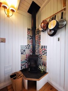 the hobbit small wood burning stove installed in a shepherds hut westfield house farm