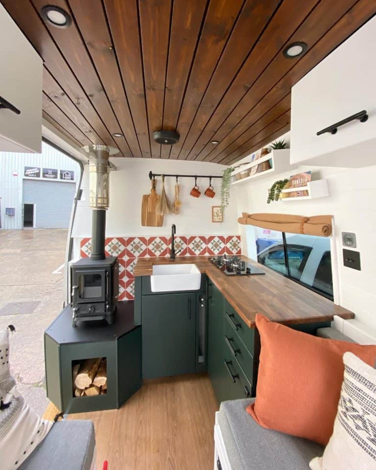 Hobbit small wood burning stove installed in a Vanfolk campervan conversion 1