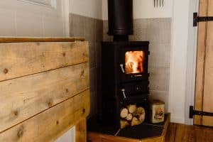 The Hobbit small wood burning stove installed in a shepherds hut Old Tinny Stamford Cider Huts 1