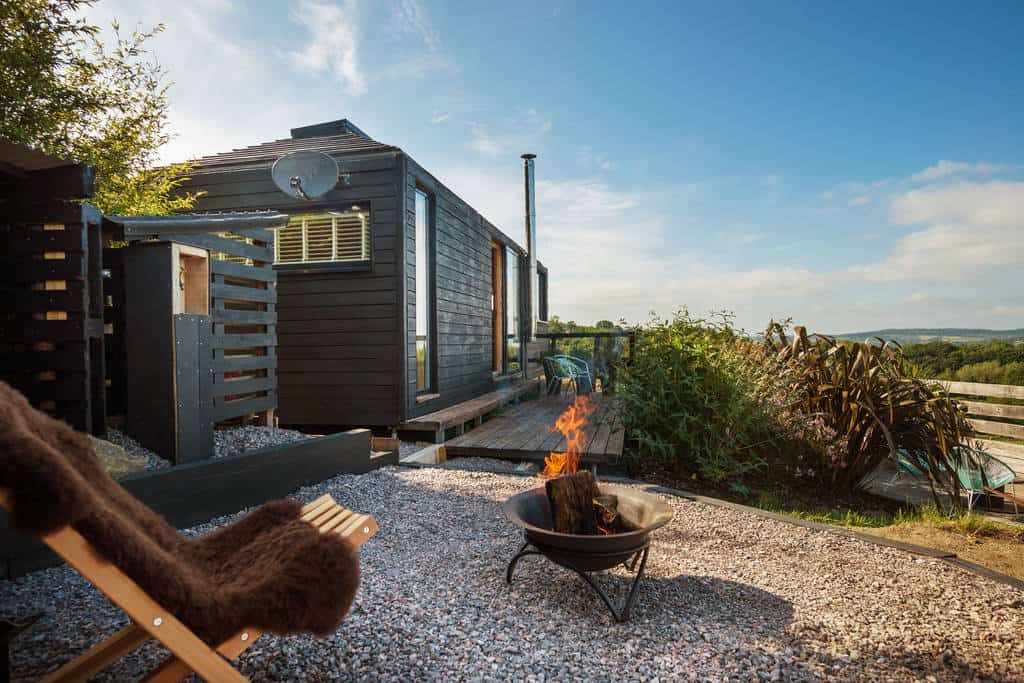 The Hobbit Small Wood Burning Stove Installed In A Cabin Red Kite Lodge 1