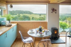 The Hobbit Small Wood Burning Stove Installed In A Cabin Red Kite Lodge 2