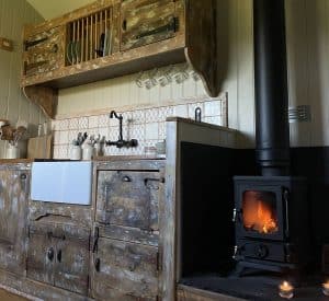 The Hobbit small wood burning stove installed in a rustic shepherds hut Leonora 2