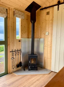 Salamander Stoves The Hobbit Small Wood Burning Stove Installed Into A Shepherds Hut The Stone Wall Hideaway 2