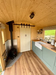 Salamander Stoves The Hobbit Small Wood Burning Stove Installed Into A Shepherds Hut The Stone Wall Hideaway 4