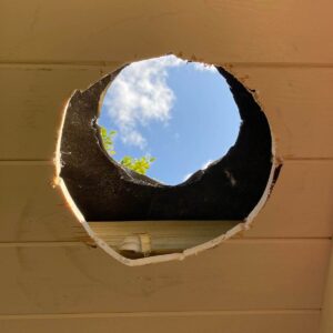 Salamander Stoves Hole Cut In Shepherd's Hut Ceiling