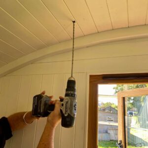 Salamander Stoves Installing a Wood Burner into a Shepherd's Hut Drilling the Centre Point