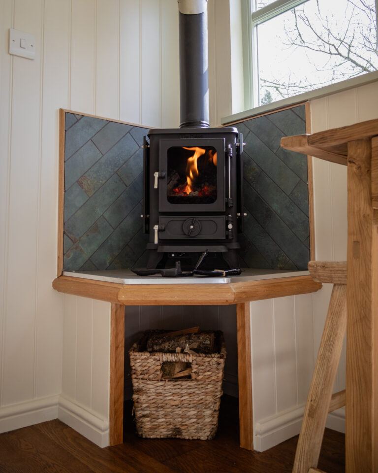 Hobbit small wood burning stove installed into a shepherds hut